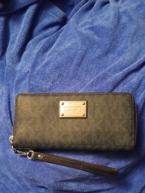 Michael Kors Black Leather Zip Wristlet with Gold Plaque